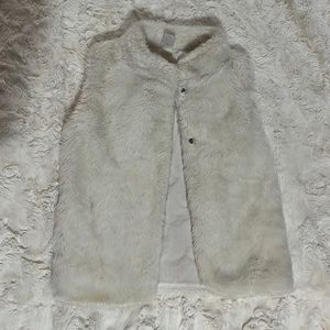 Girls fur sleeveless vest.